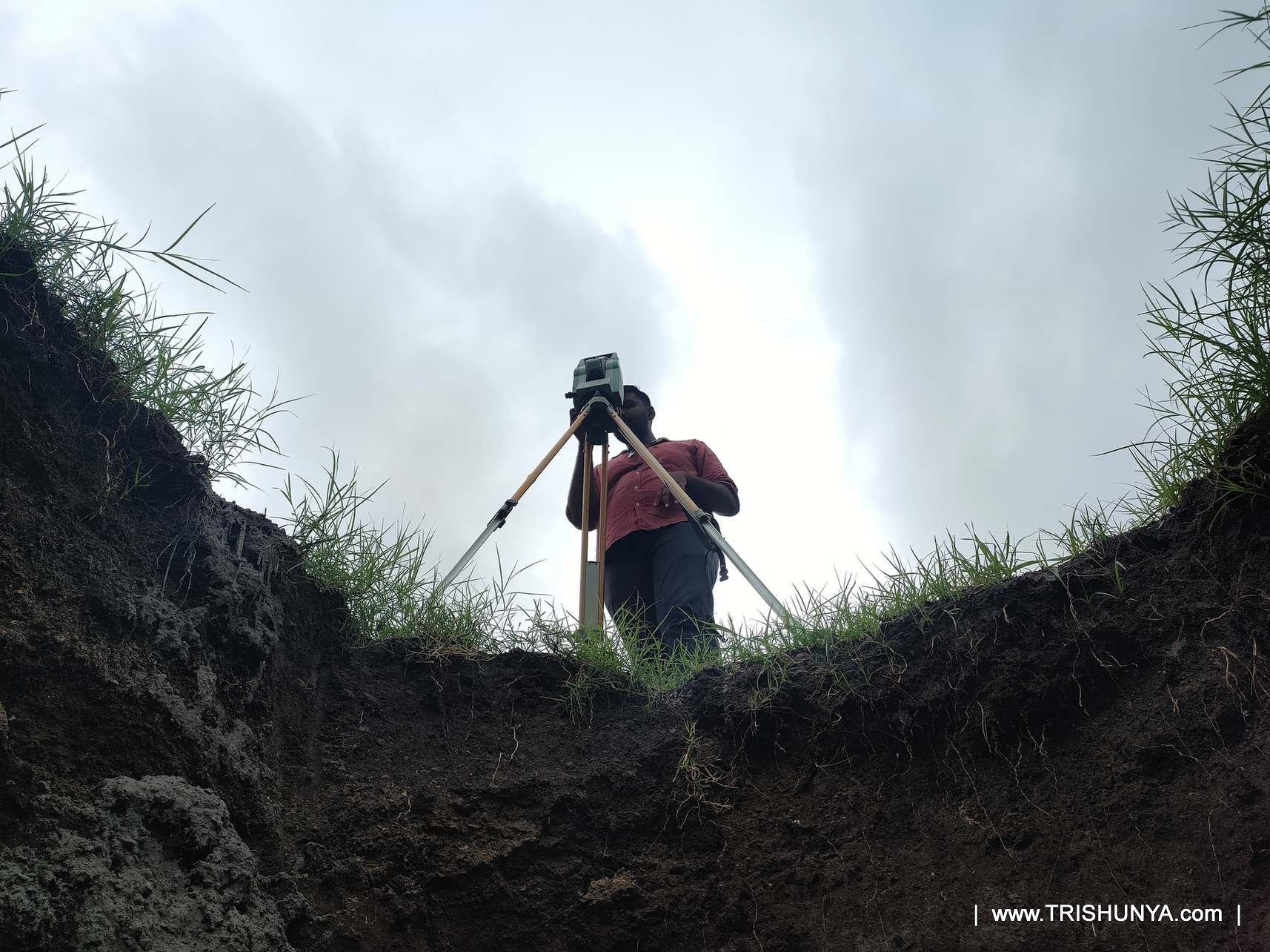 Total Station used for wind turbine foundation point marking, viewed from excavated pit