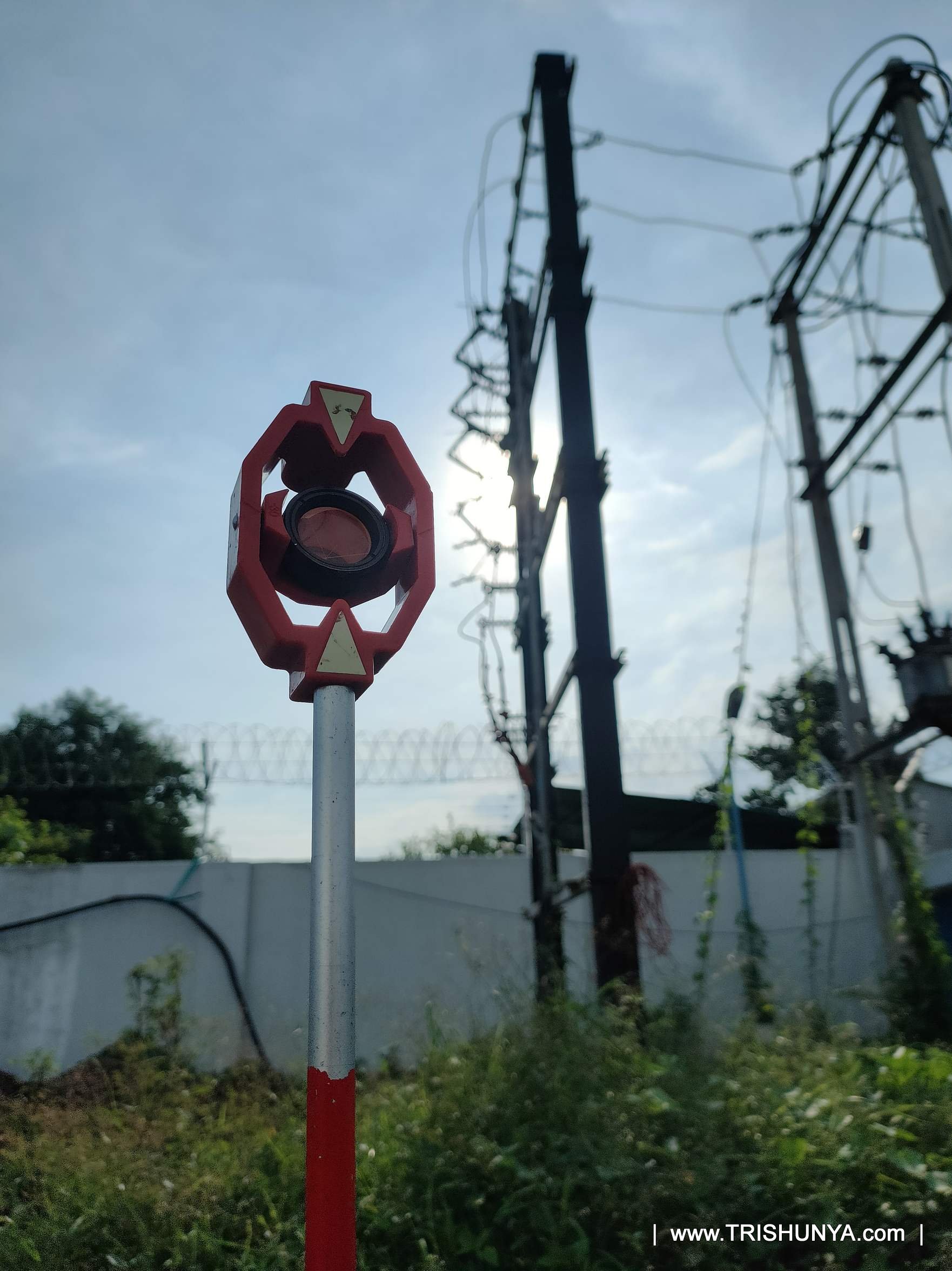 Mini prism on survey rod used for higher accuracy point demarcation
