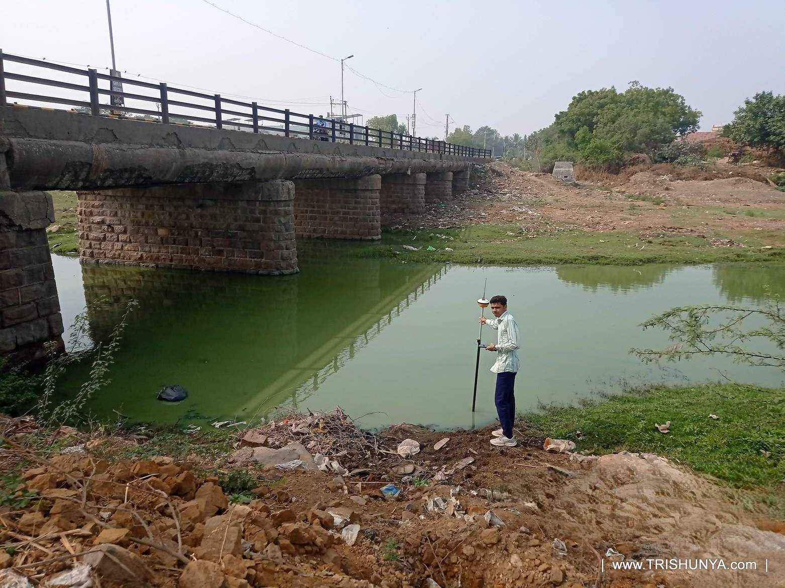 DGPS device being used for topographic survey work near a river