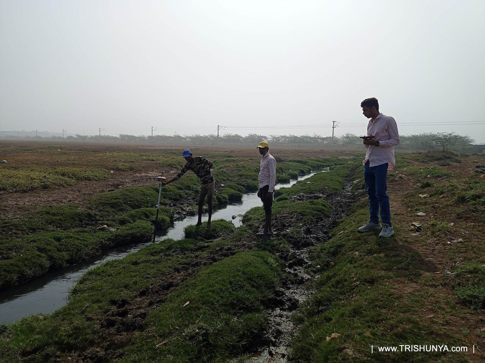 Second view of DGPS device in use during topographic survey field work