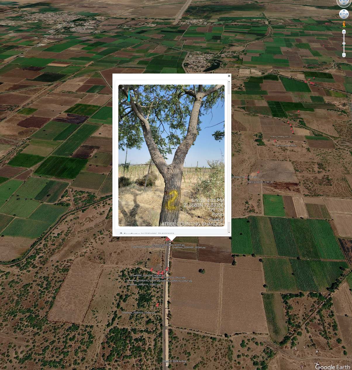 KMZ placemark popup card displaying survey photo with capture date, time and GPS coordinates