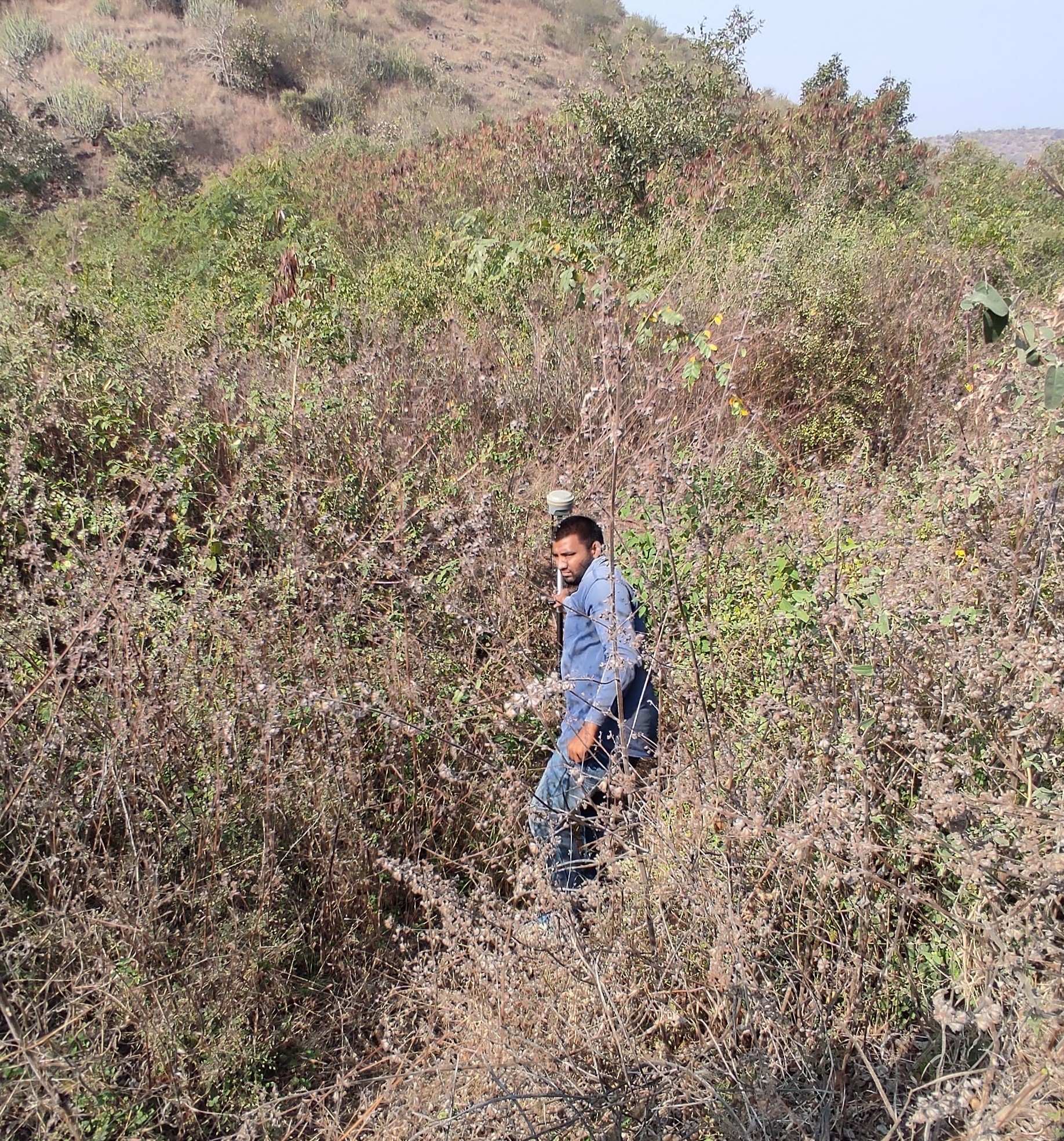 Dense bushes and uneven unwalkable terrain during DGPS canal survey in Gujarat