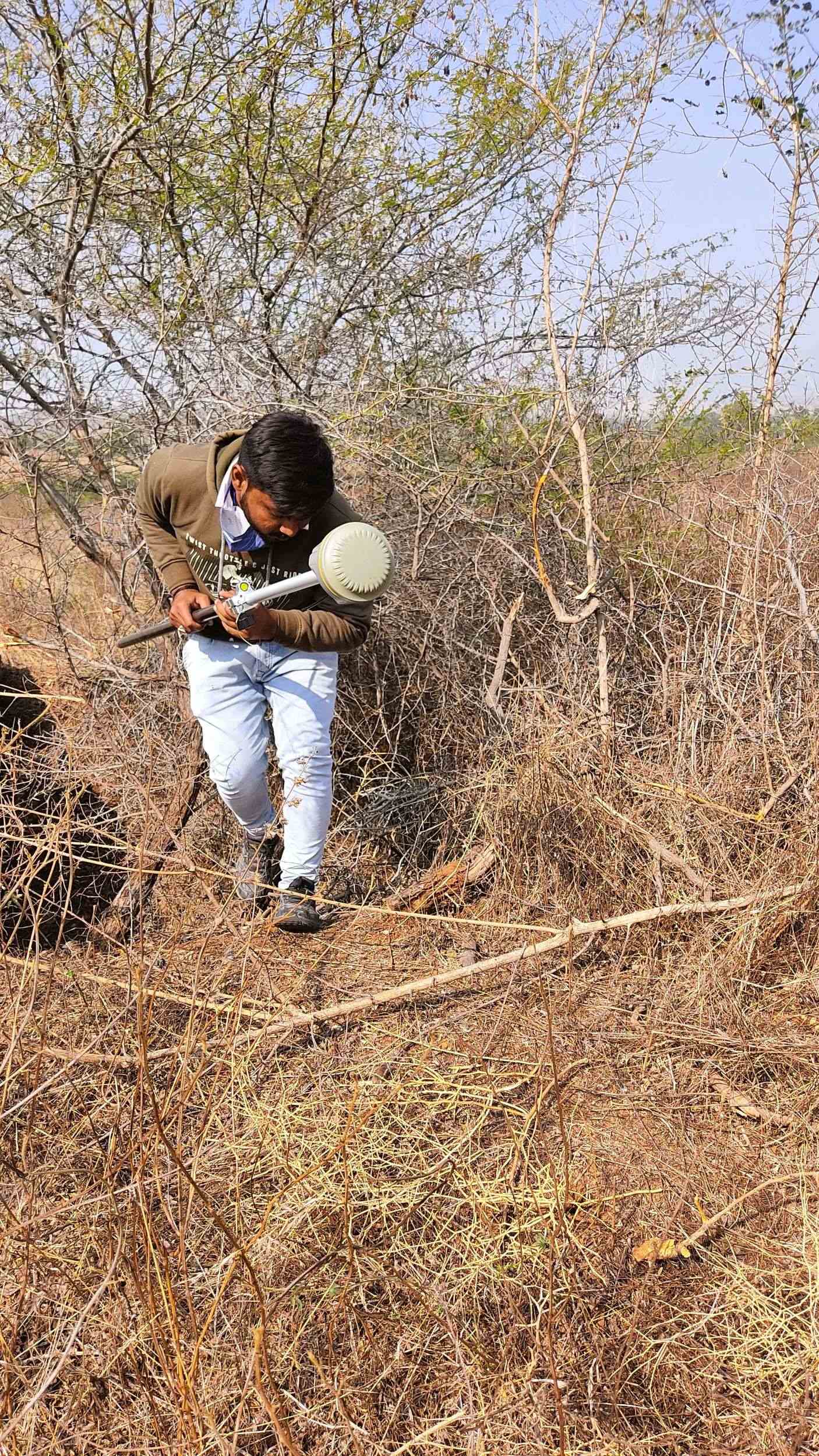 Thick scrub and rough ground conditions on DGPS survey route Gujarat irrigation project